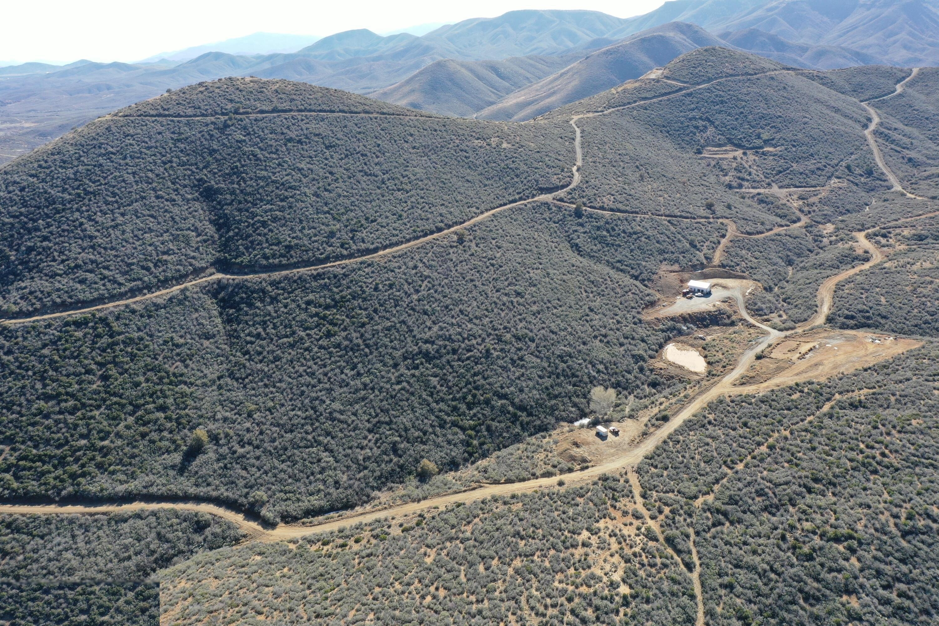 Aerial view of forested ridge and private road