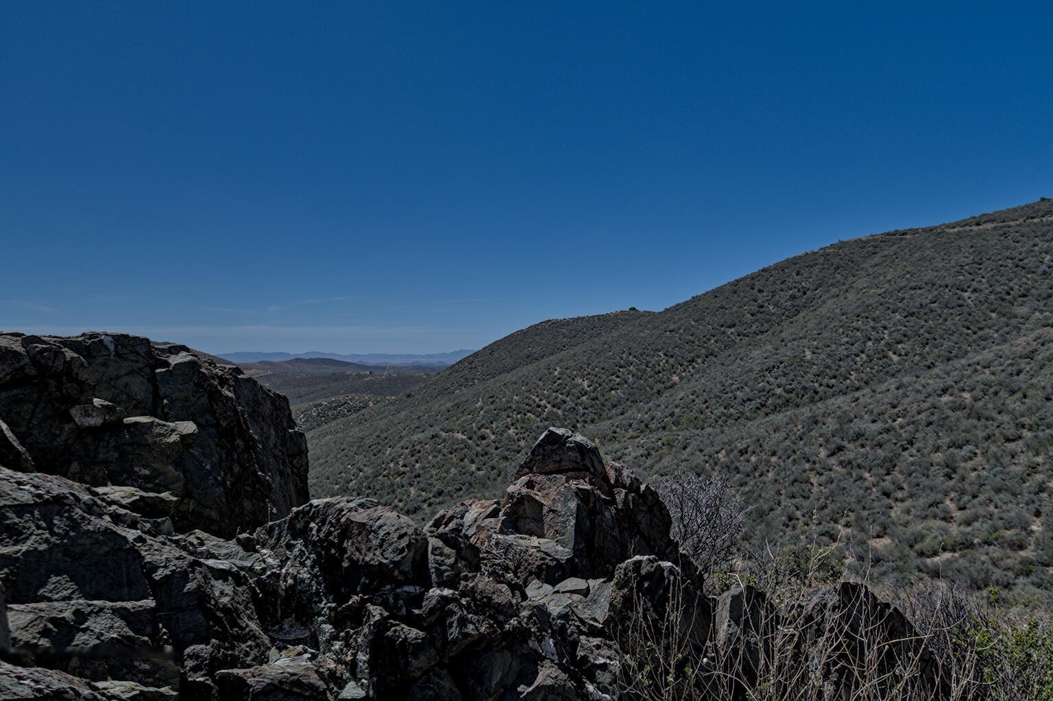 Boulder outcrop with canyon view